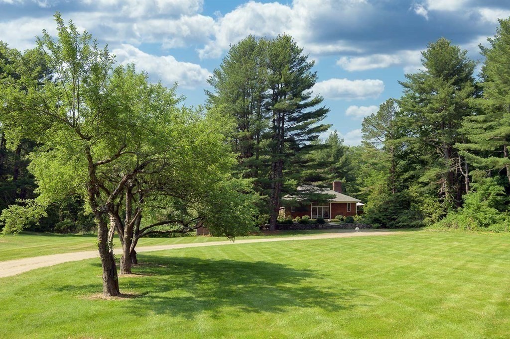 105 Trapelo Road Lincoln, MA 01773 - Photo 28 of 34 a view of a field of grass and trees
