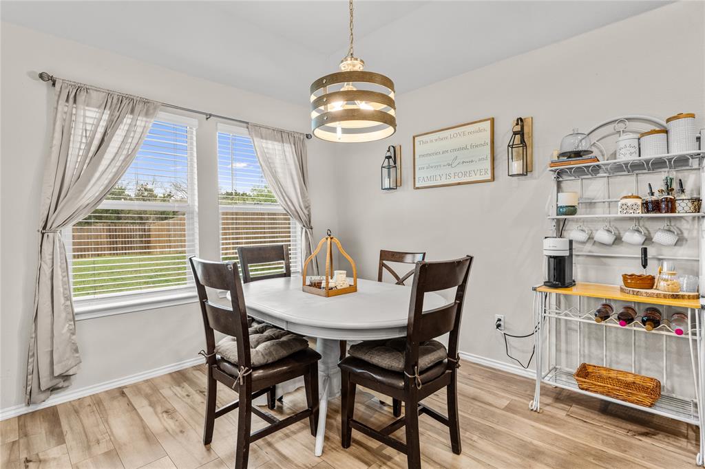 7121 Guadalupe Road Waco, TX 76633 - Photo 18 of 38 a view of a dining room with furniture and window