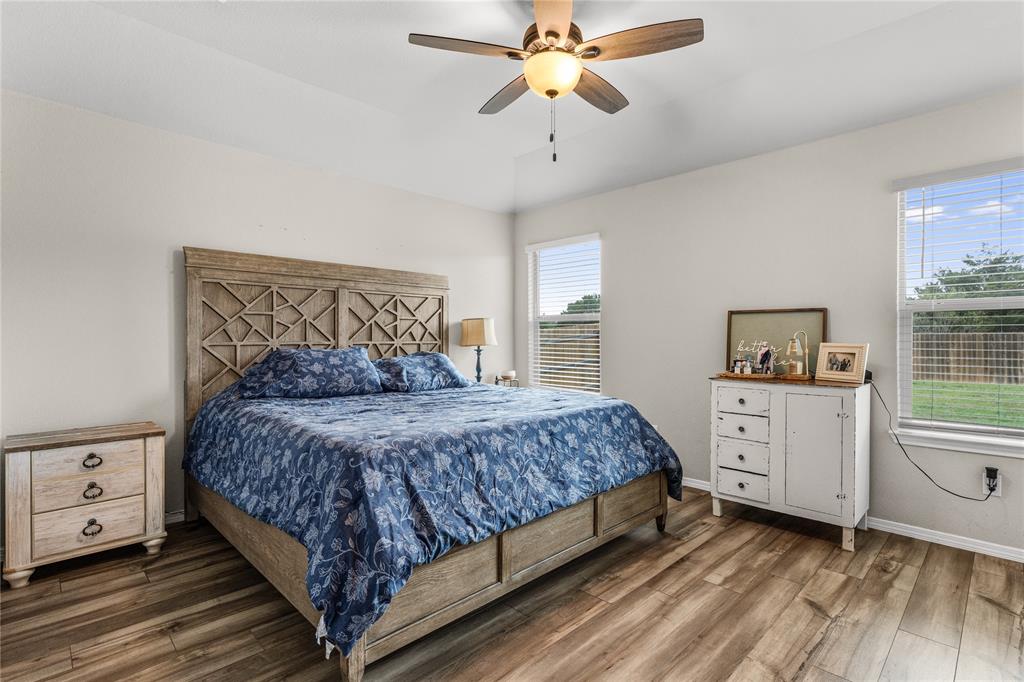 7121 Guadalupe Road Waco, TX 76633 - Photo 20 of 38 a bedroom with a bed and a dresser