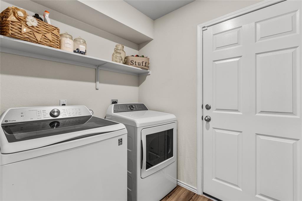 7121 Guadalupe Road Waco, TX 76633 - Photo 26 of 38 a utility room with dryer and washer