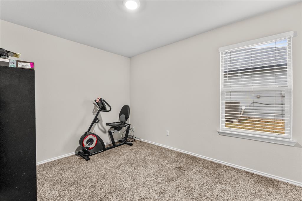 7121 Guadalupe Road Waco, TX 76633 - Photo 31 of 38 a view of a room with gym equipment