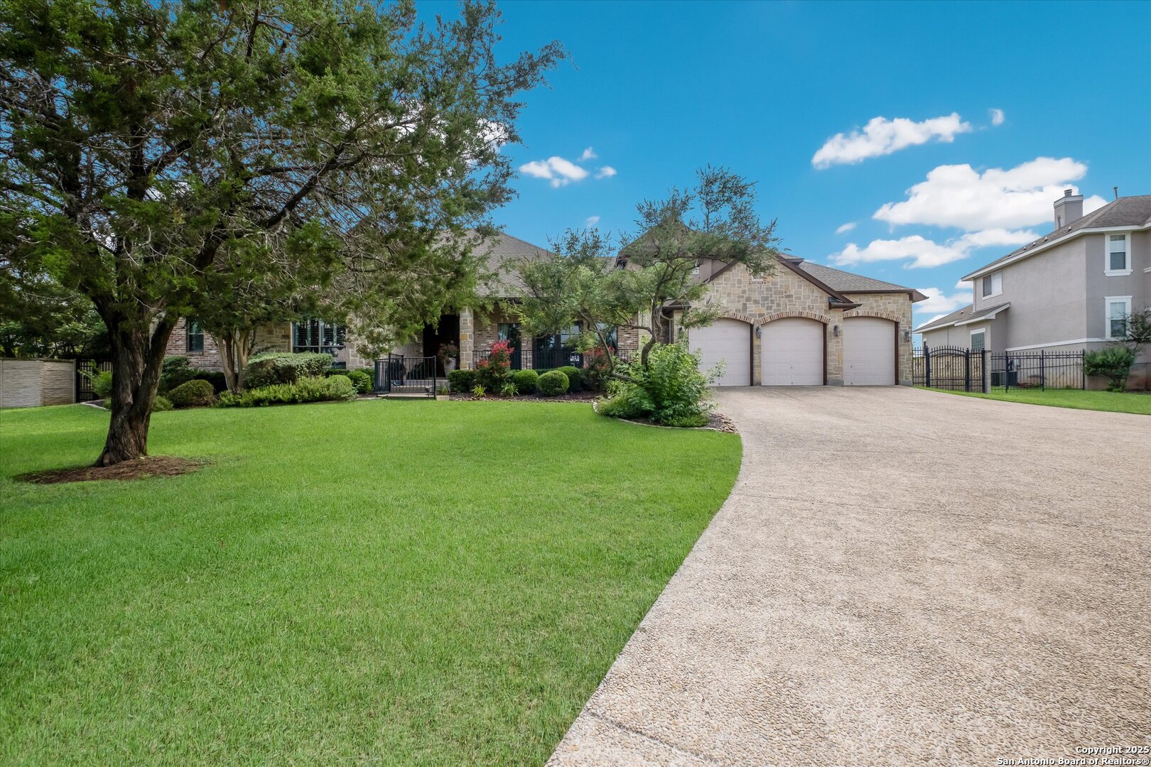 611 Ridge San Antonio, TX 78258 - Photo 2 of 42 a view of a white house with a yard and plants