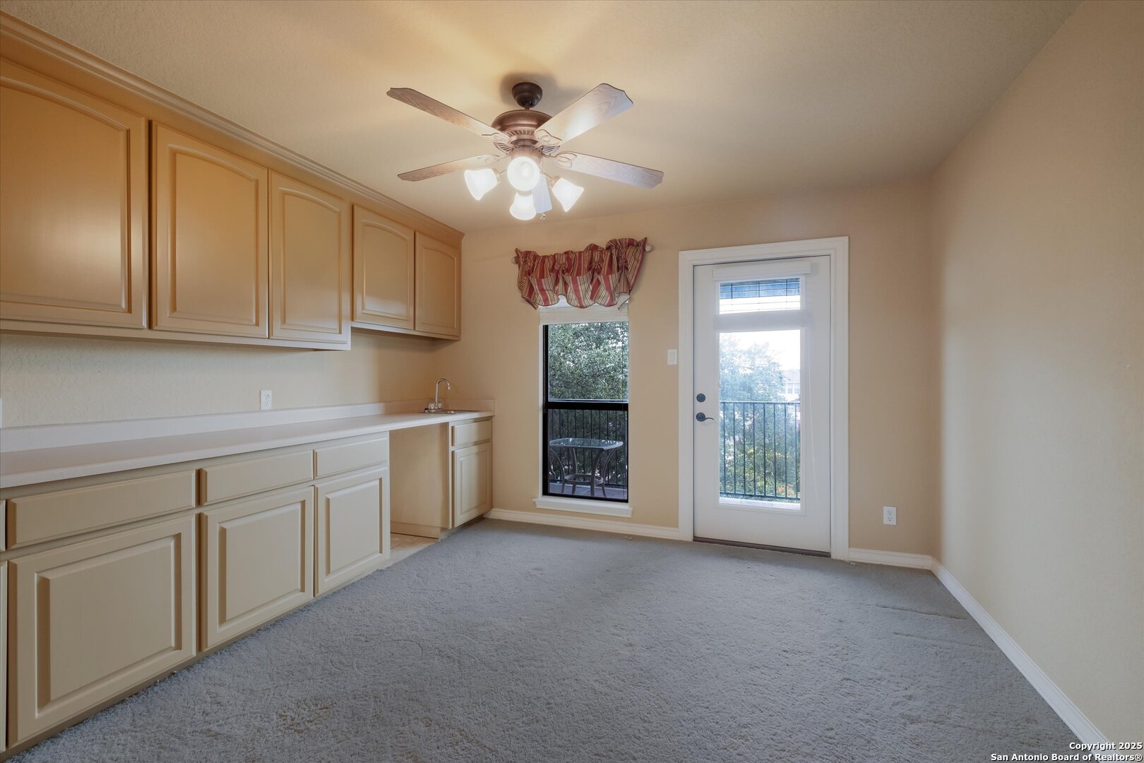 611 Ridge San Antonio, TX 78258 - Photo 27 of 42 a view of an empty room with a kitchen