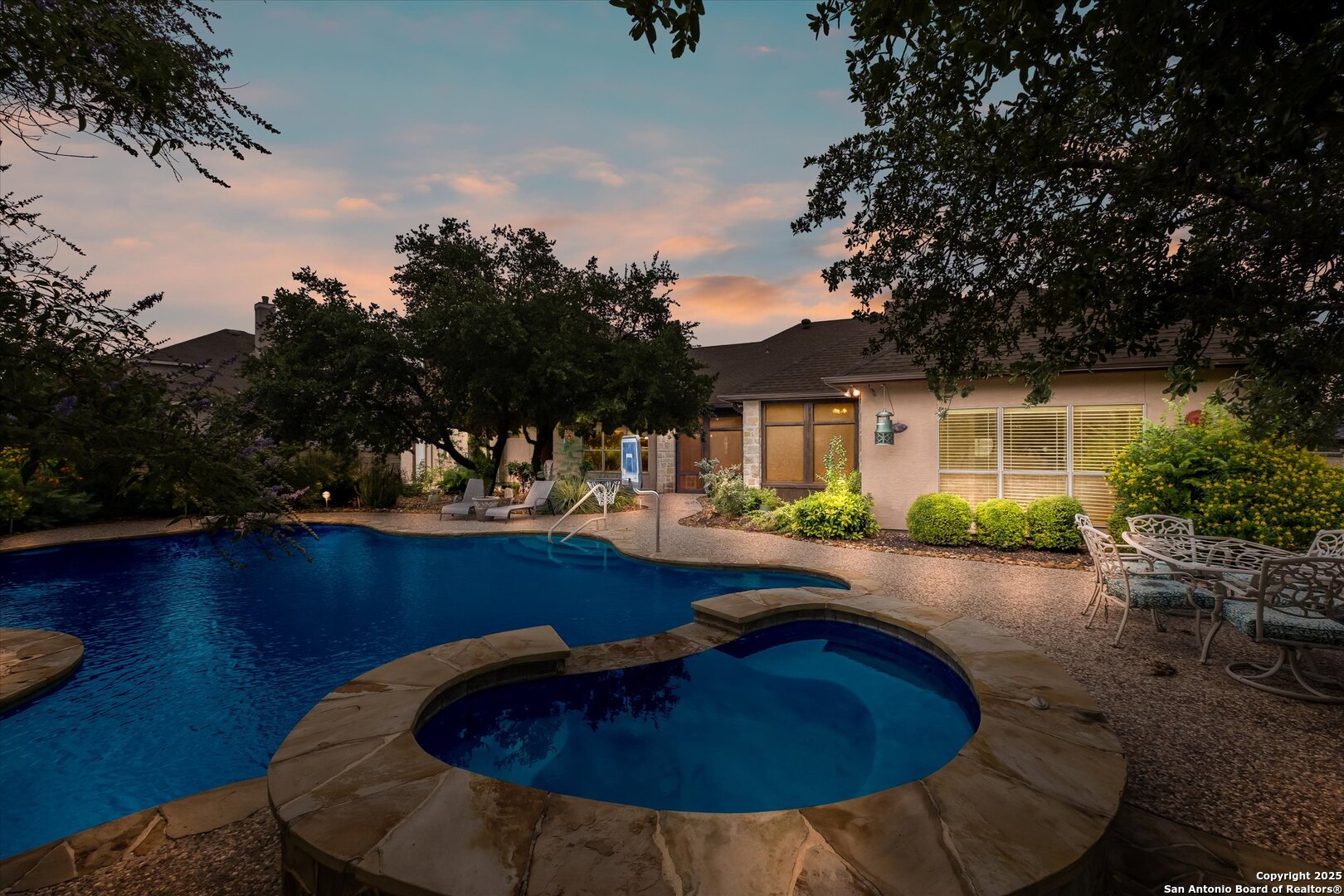 611 Ridge San Antonio, TX 78258 - Photo 36 of 42 a swimming pool with outdoor seating and yard