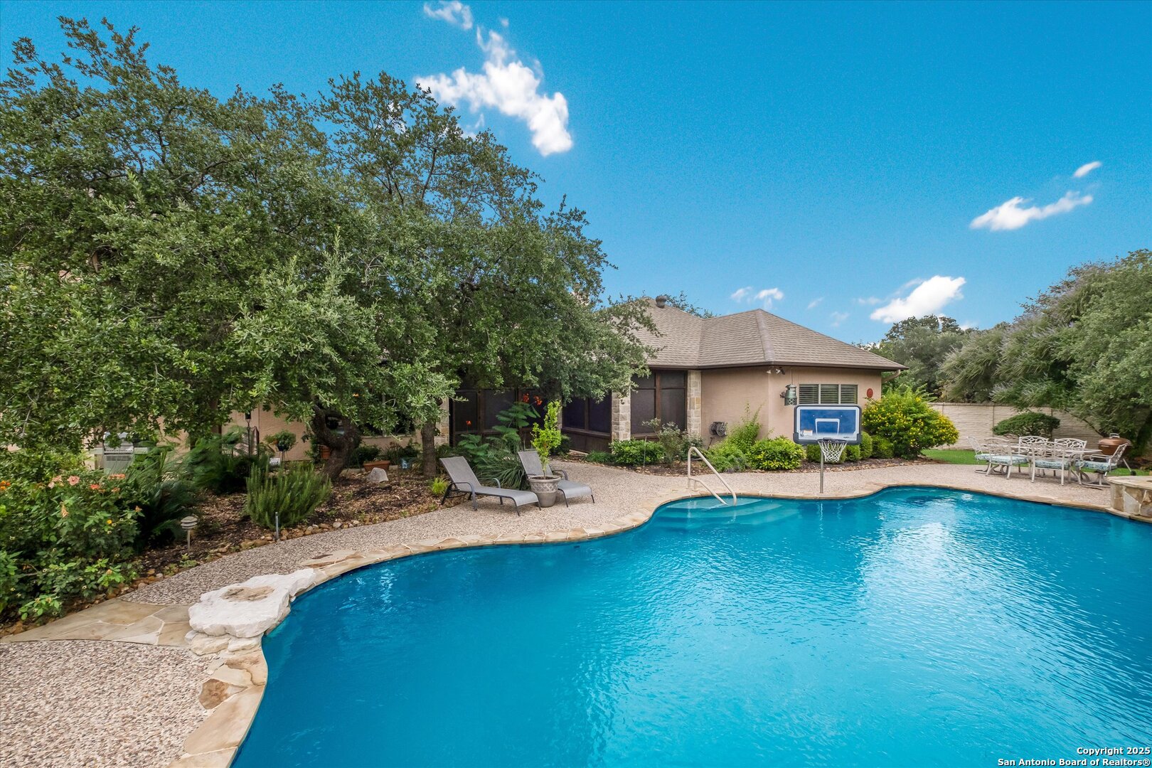 611 Ridge San Antonio, TX 78258 - Photo 39 of 42 a view of house with yard outdoor seating and lake view
