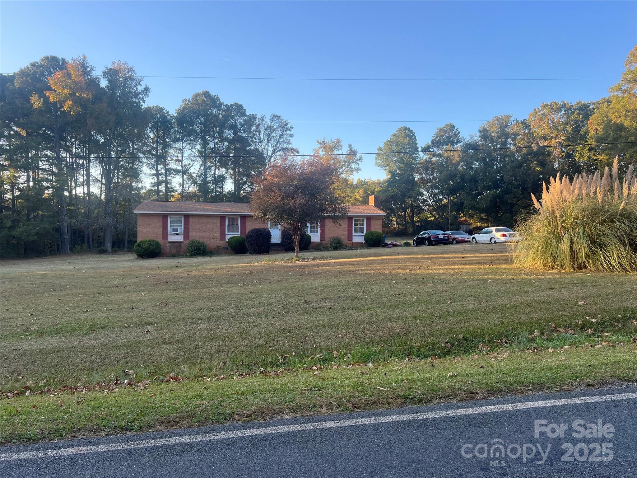 10320 Troutman Road Midland, NC 28107 - Photo 1 of 1 a view of big yard with large trees