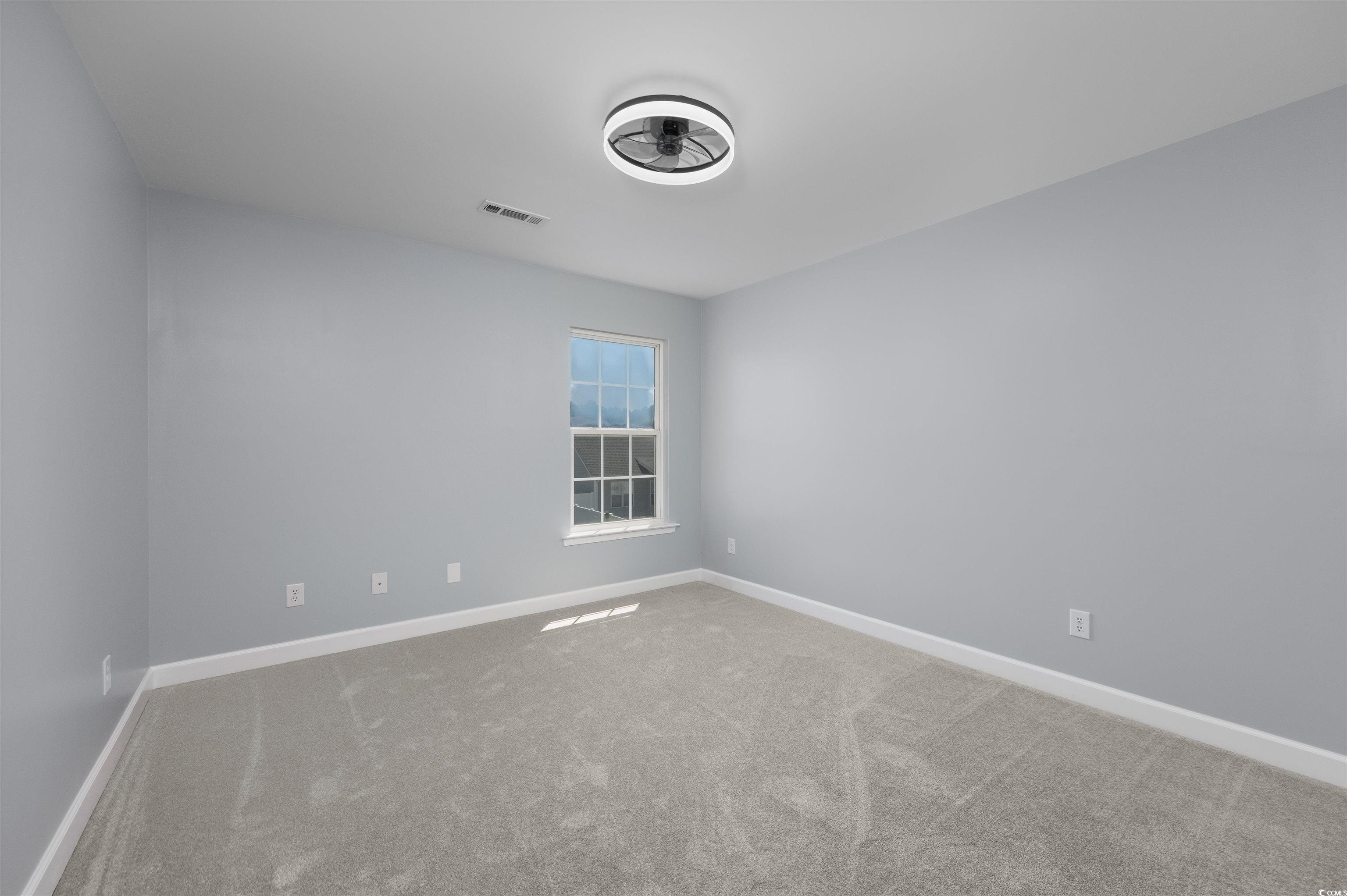 1031 Snowberry Drive Longs, SC 29568 - Photo 22 of 38 Carpeted spare room with baseboards