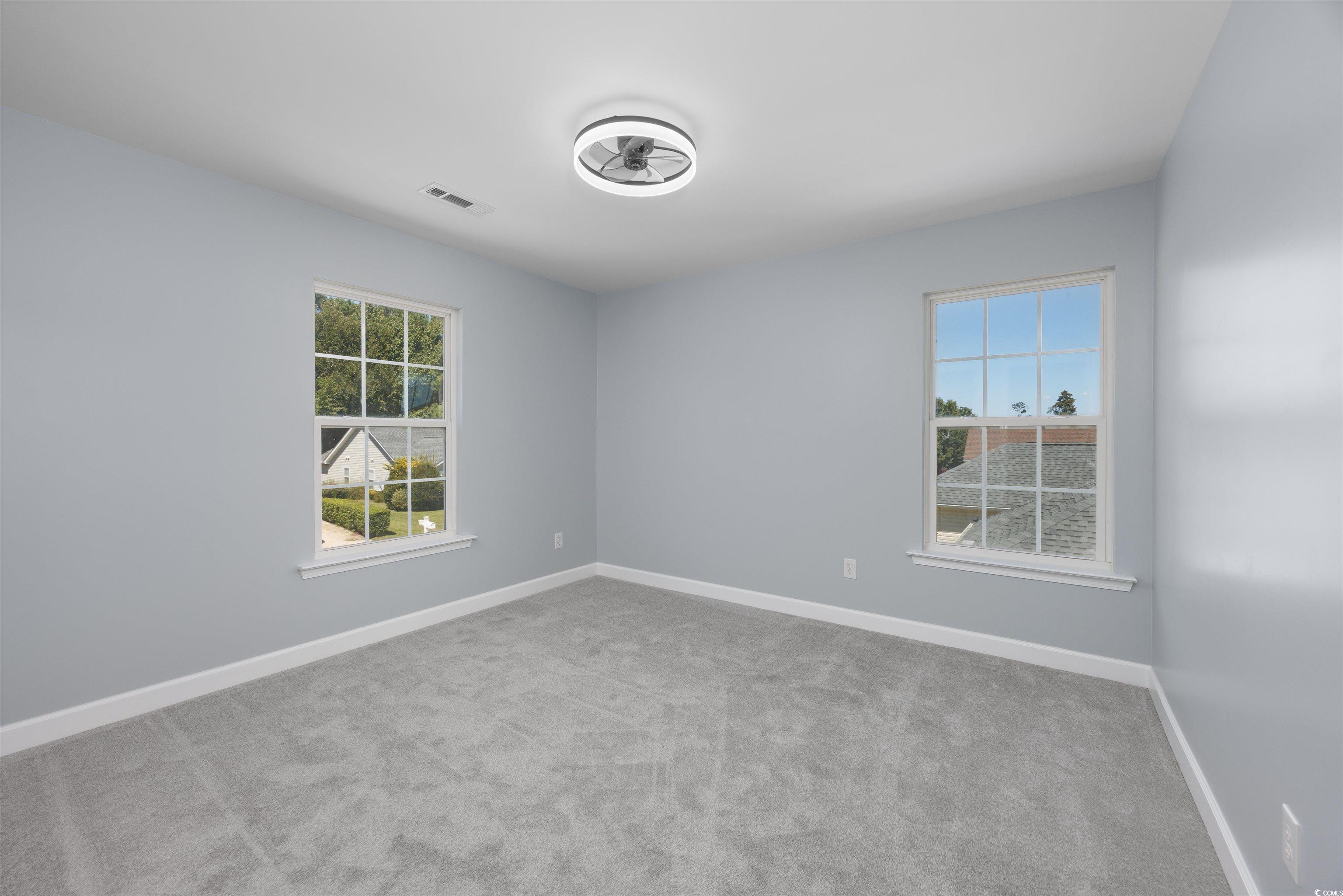1031 Snowberry Drive Longs, SC 29568 - Photo 27 of 38 Spare room featuring light carpet and plenty of natural light