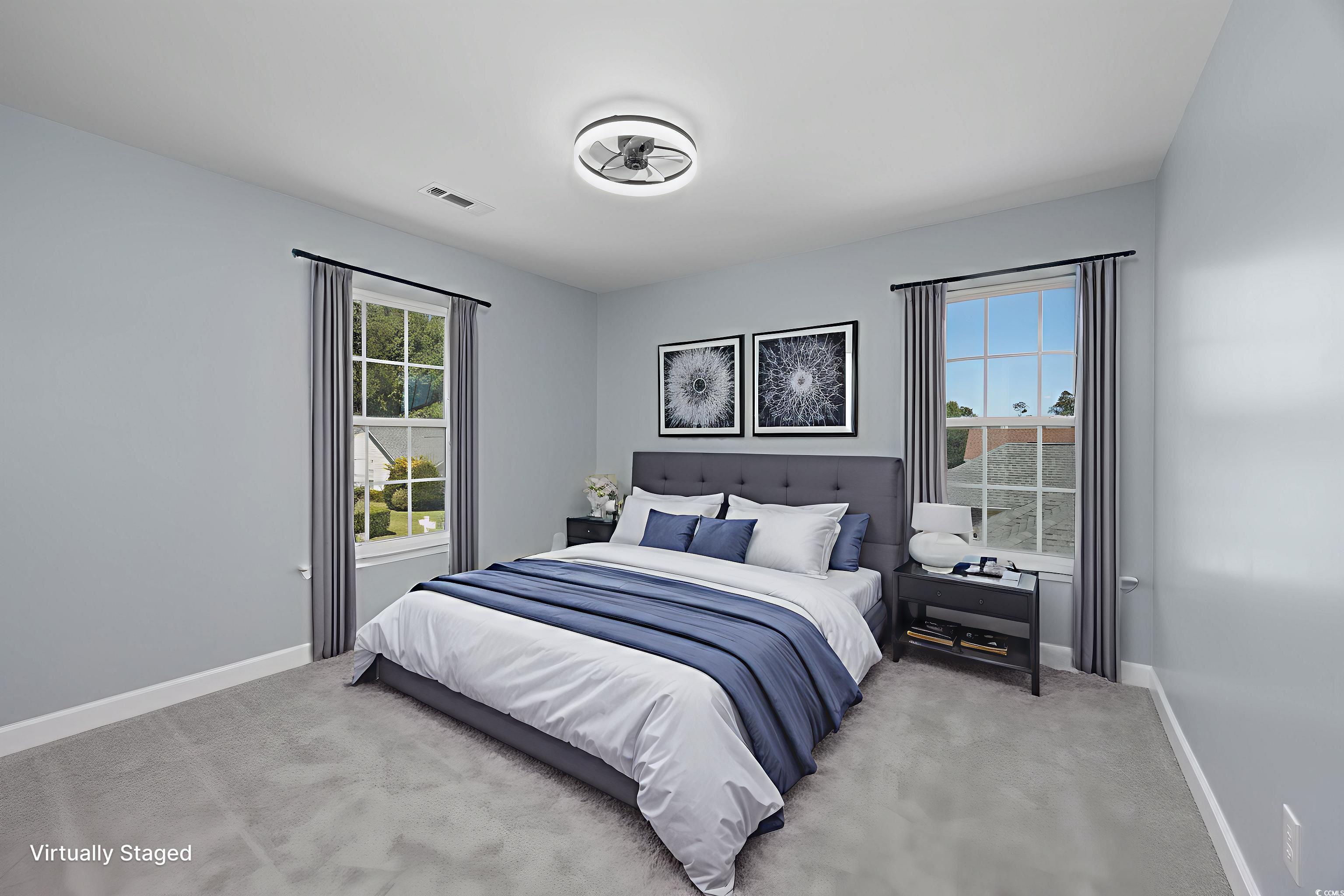 1031 Snowberry Drive Longs, SC 29568 - Photo 28 of 38 Bedroom with carpet and multiple windows