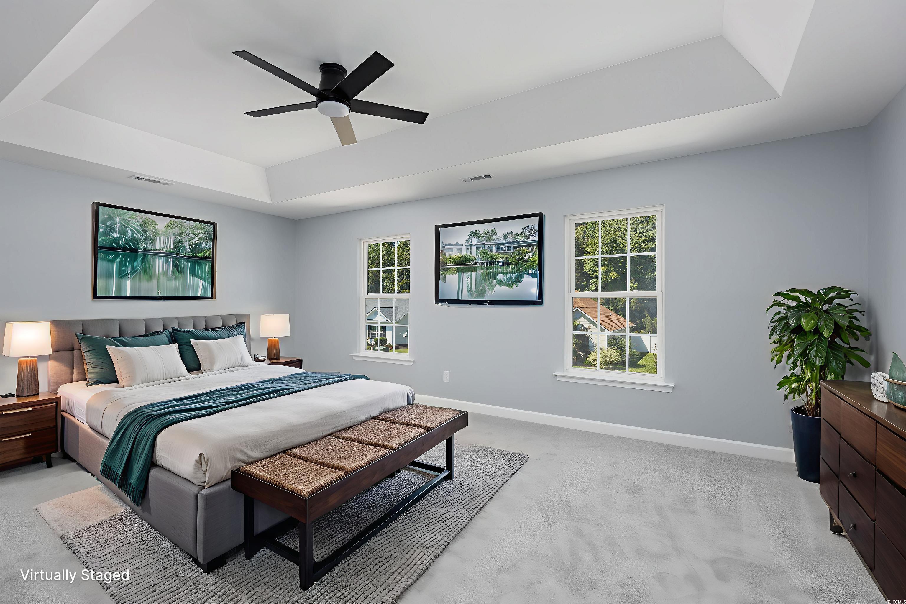 1031 Snowberry Drive Longs, SC 29568 - Photo 32 of 38 Bedroom featuring a raised ceiling, light colored carpet, and ceiling fan