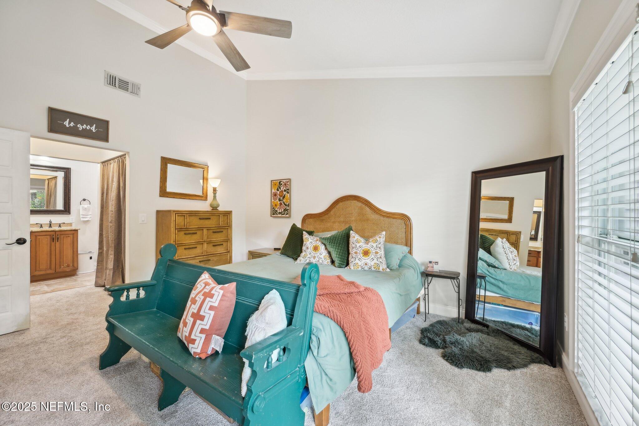 585 Pine Forest Trail Orange Park, FL 32073 - Photo 28 of 52 a bedroom with furniture and a wooden floor