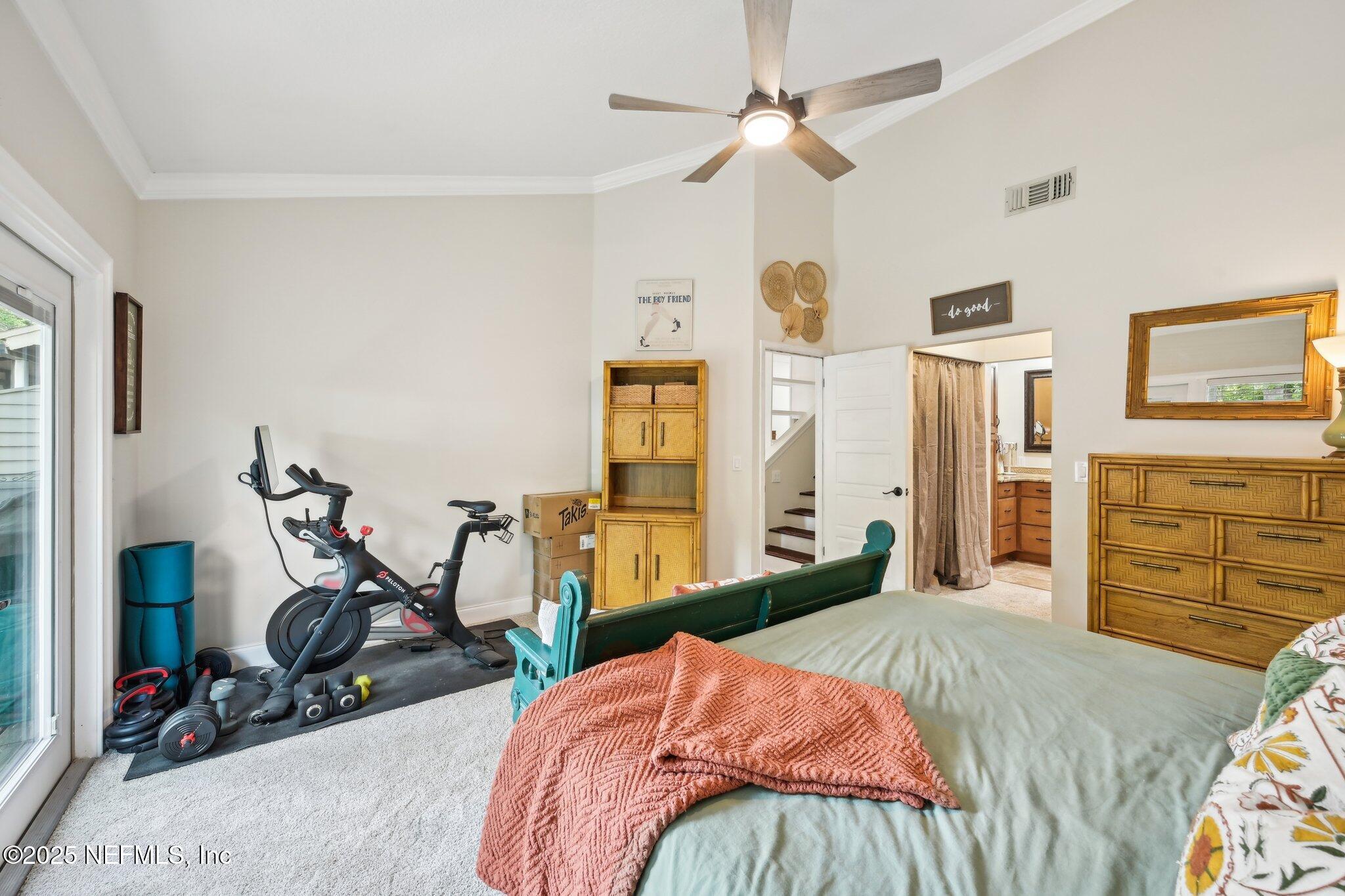 585 Pine Forest Trail Orange Park, FL 32073 - Photo 29 of 52 a bedroom with bed and ceiling fan
