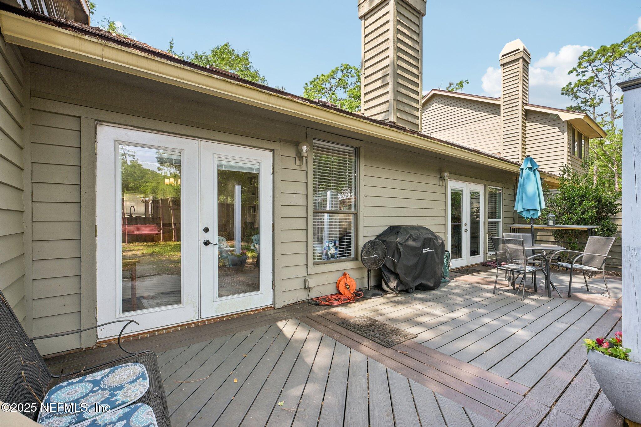 585 Pine Forest Trail Orange Park, FL 32073 - Photo 37 of 52 a view of a two chairs in the patio