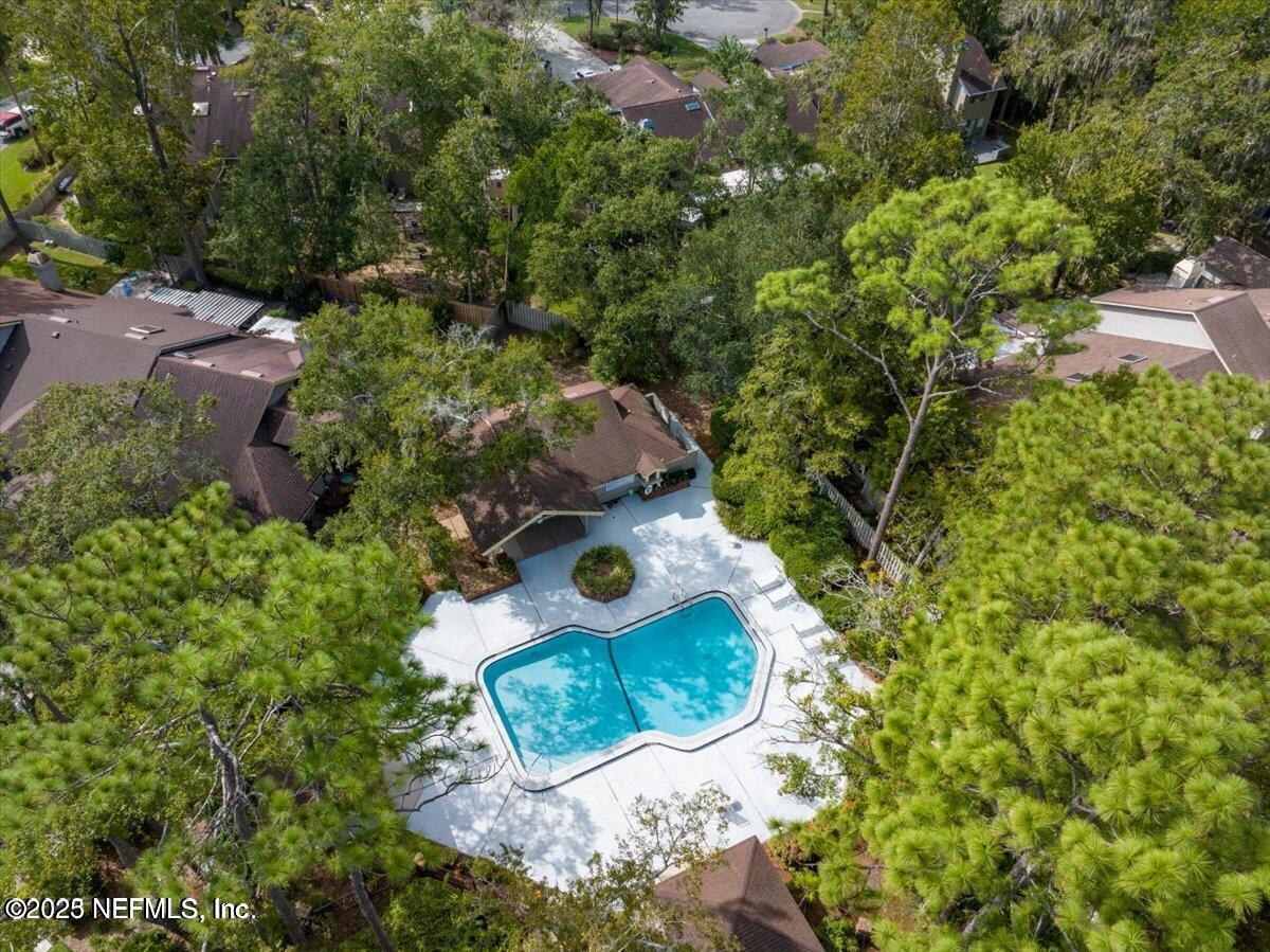 585 Pine Forest Trail Orange Park, FL 32073 - Photo 49 of 52 an aerial view of a house with a yard and trees