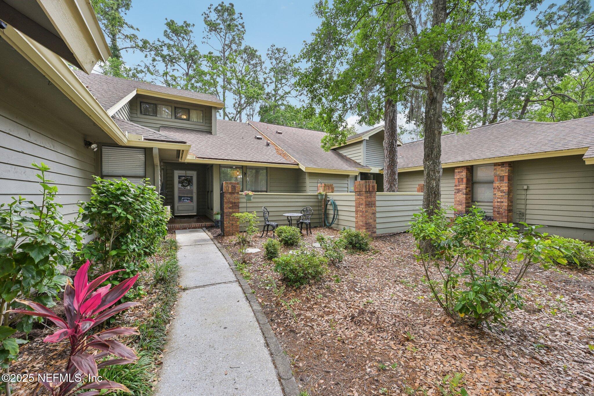 585 Pine Forest Trail Orange Park, FL 32073 - Photo 7 of 52 a front view of a house with a yard