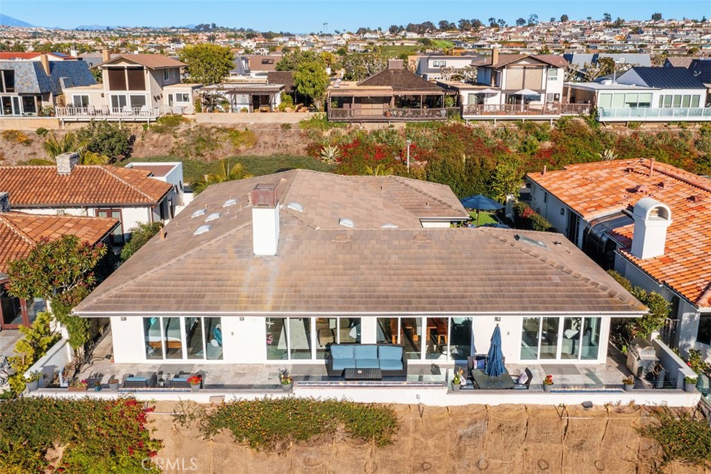 33675 Magellan Dana Point, CA 92629 - Photo 43 of 43 an aerial view of a house with a lake view