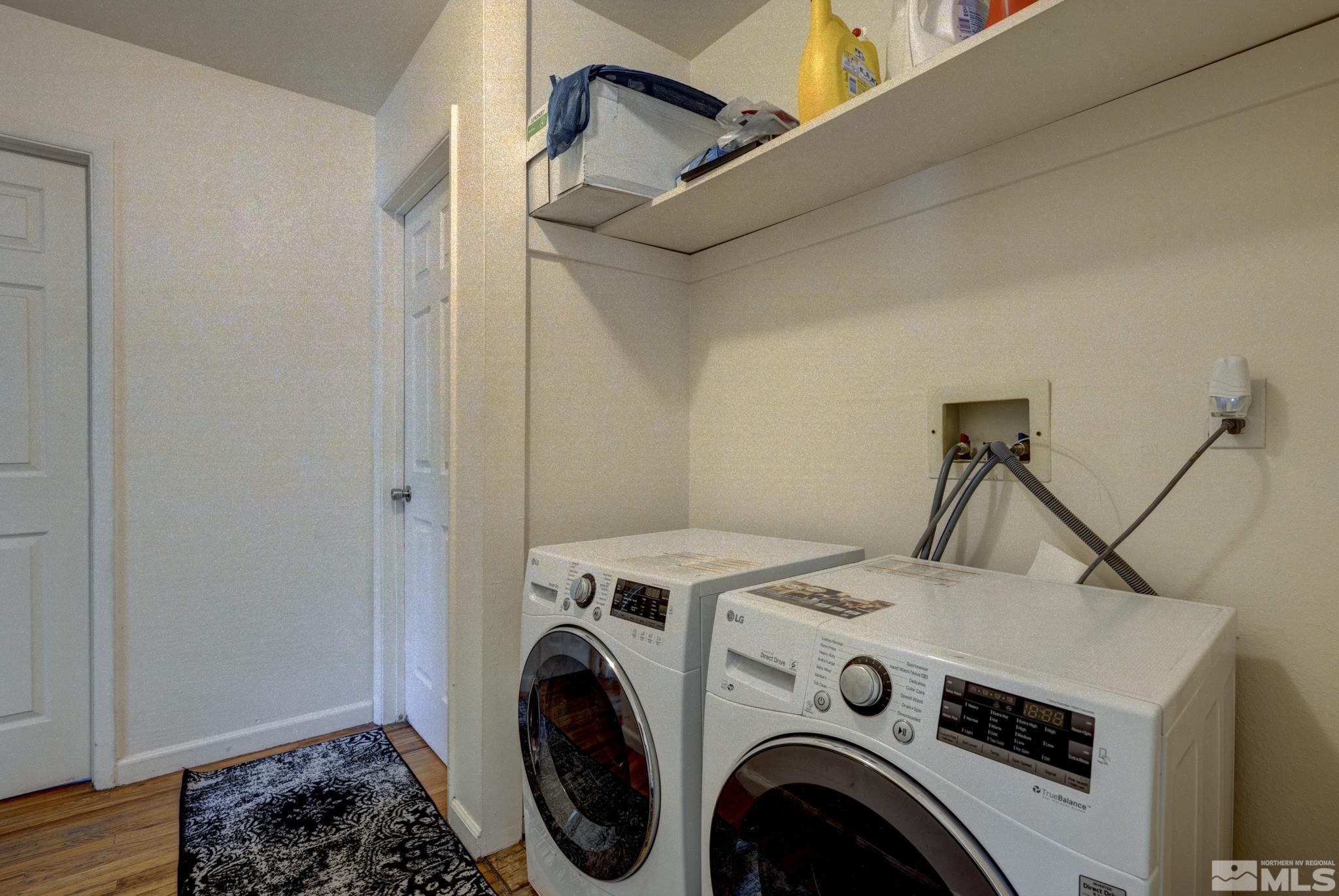 1890 Trainer Way Reno, NV 89512 - Photo 15 of 19 a utility room with dryer and washer