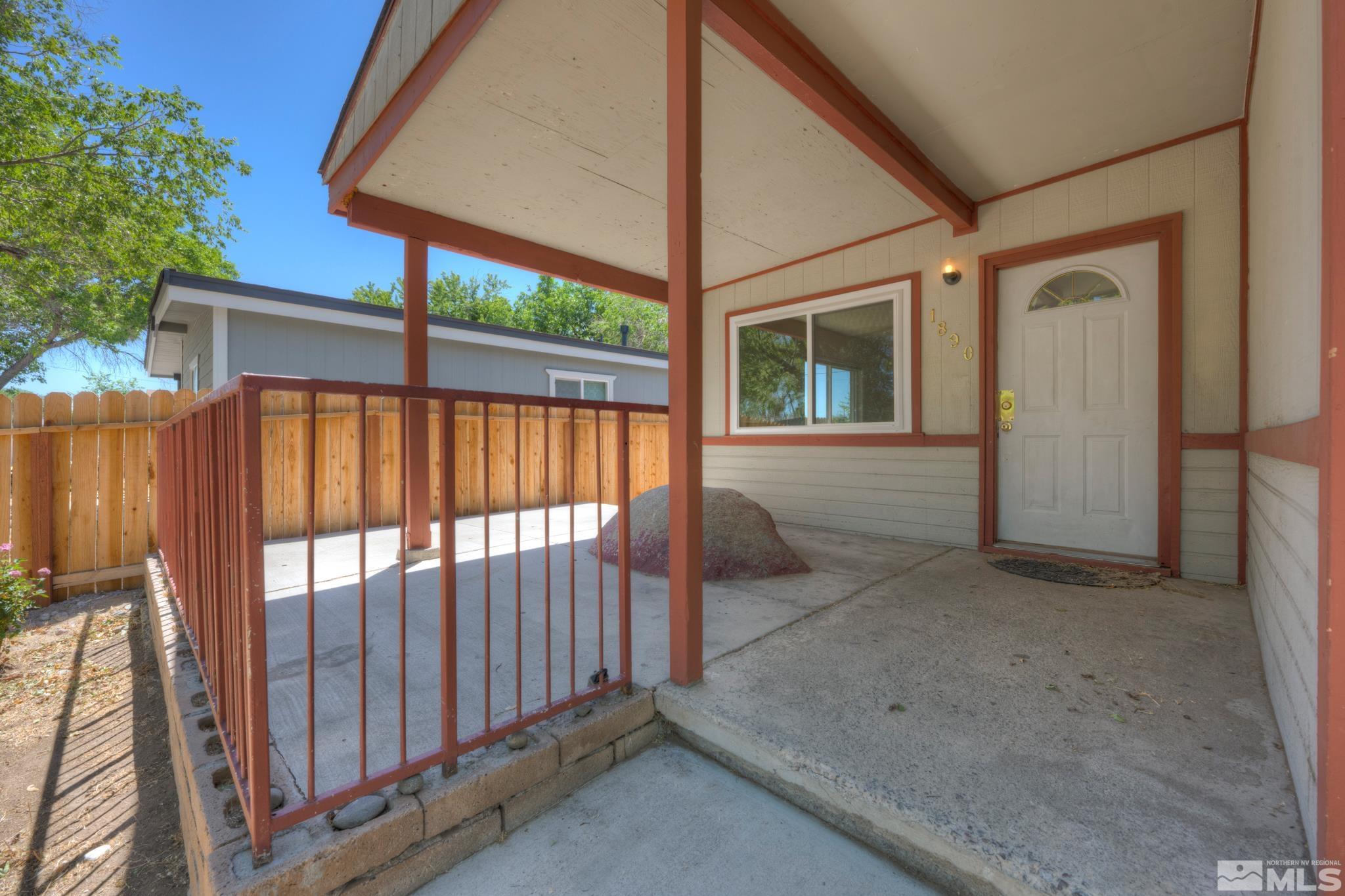 1890 Trainer Way Reno, NV 89512 - Photo 4 of 19 a view of porch with a small yard