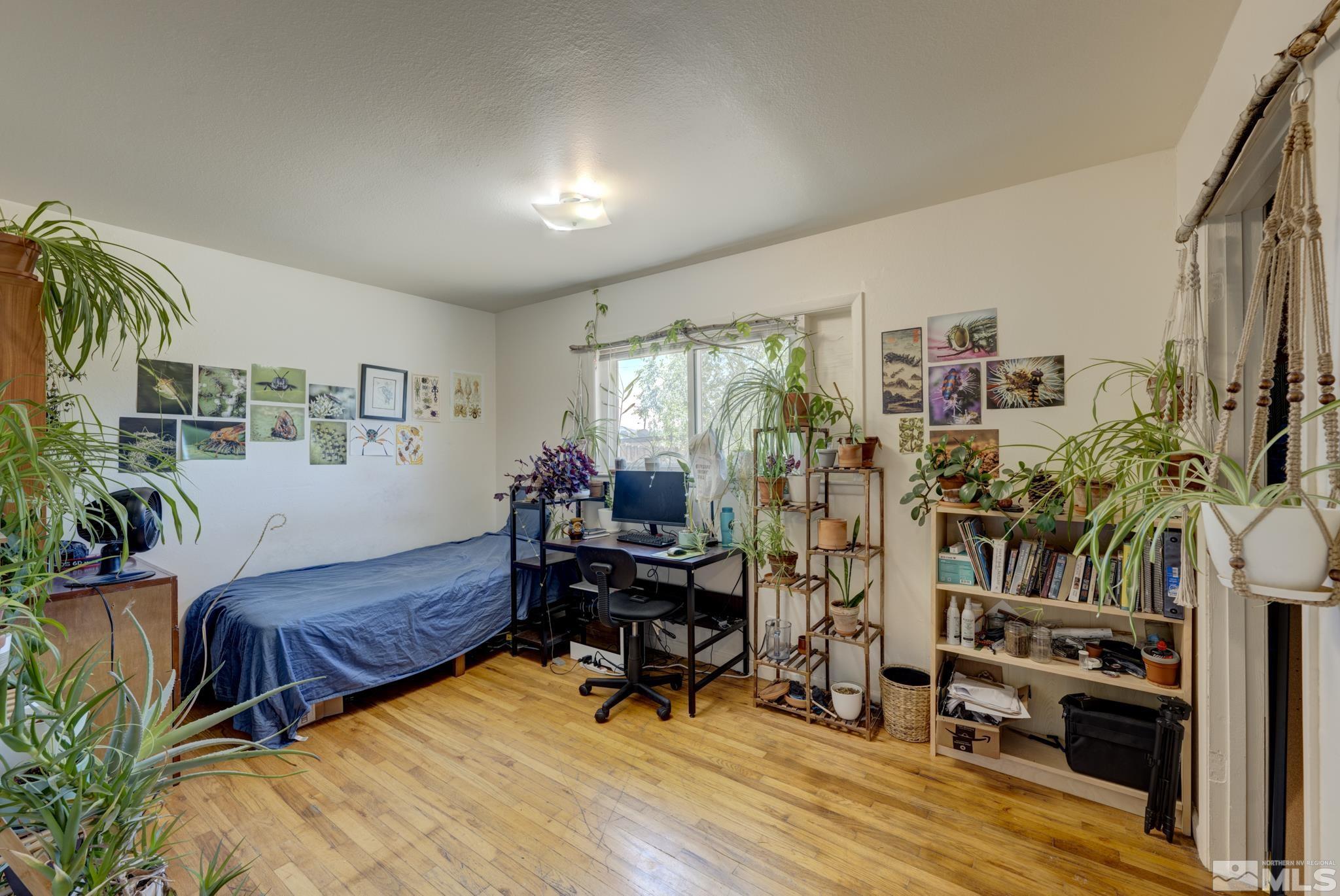 1890 Trainer Way Reno, NV 89512 - Photo 10 of 19 a living room with furniture and a flat screen tv