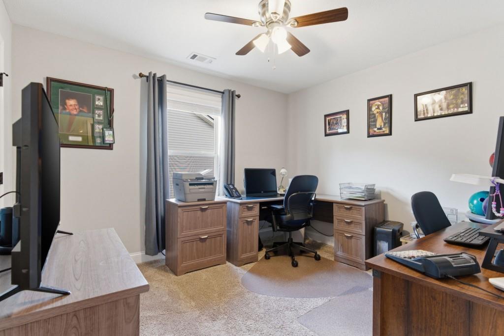 844 River Mist Circle Jefferson, GA 30549 - Photo 22 of 35 a view of a workspace with furniture and a window