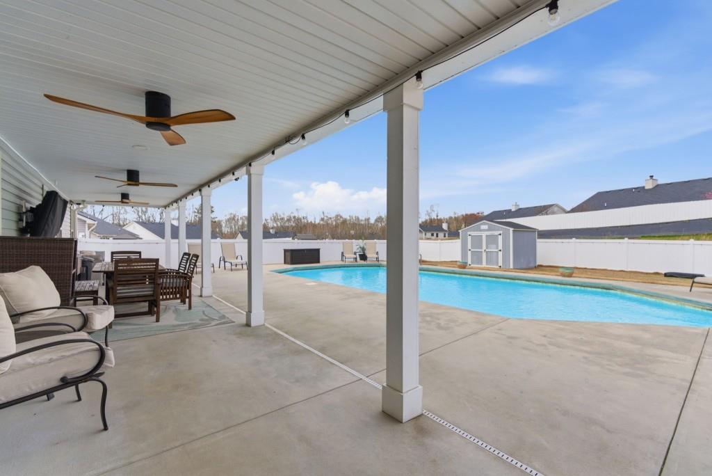 844 River Mist Circle Jefferson, GA 30549 - Photo 30 of 35 a view of a patio with a table and chairs