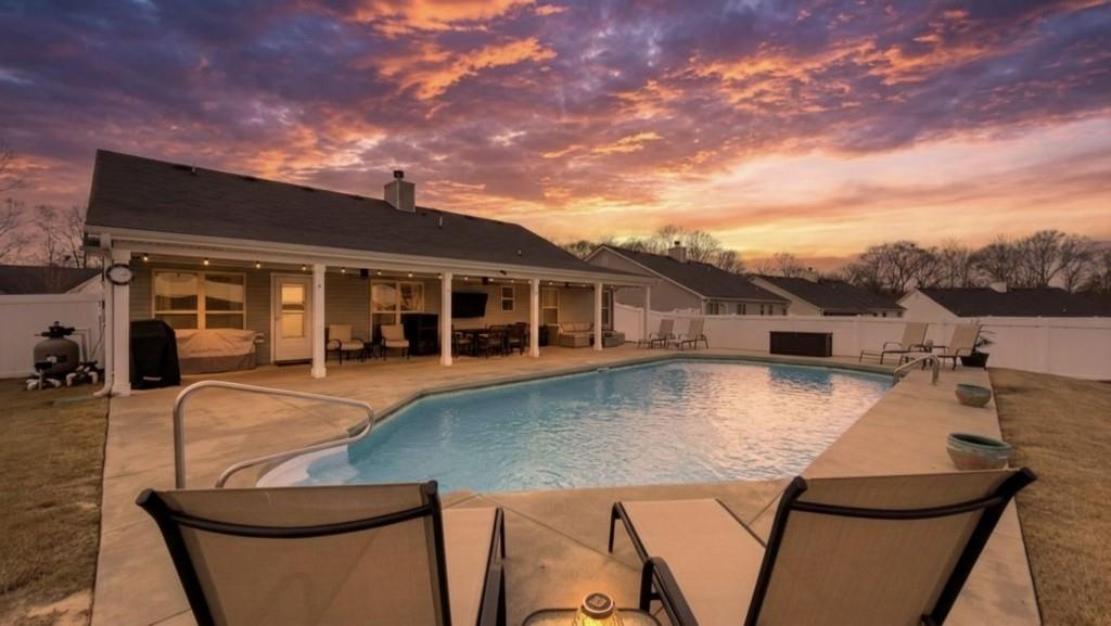 844 River Mist Circle Jefferson, GA 30549 - Photo 34 of 35 swimming pool view with a seating space