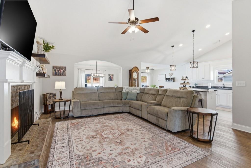 844 River Mist Circle Jefferson, GA 30549 - Photo 5 of 35 a living room with furniture and a flat screen tv
