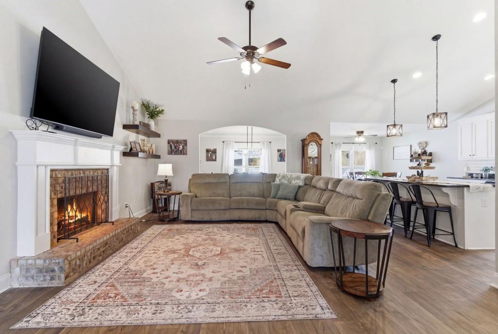 844 River Mist Circle Jefferson, GA 30549 - Photo 6 of 35 a living room with furniture and a flat screen tv