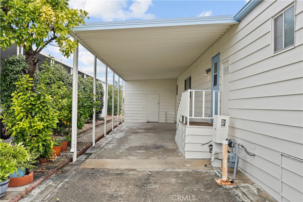 650 South Rancho Santa Fe Road, Unit 106 San Marcos, CA 92078 - Photo 12 of 55 a view of house with backyard and outdoor seating