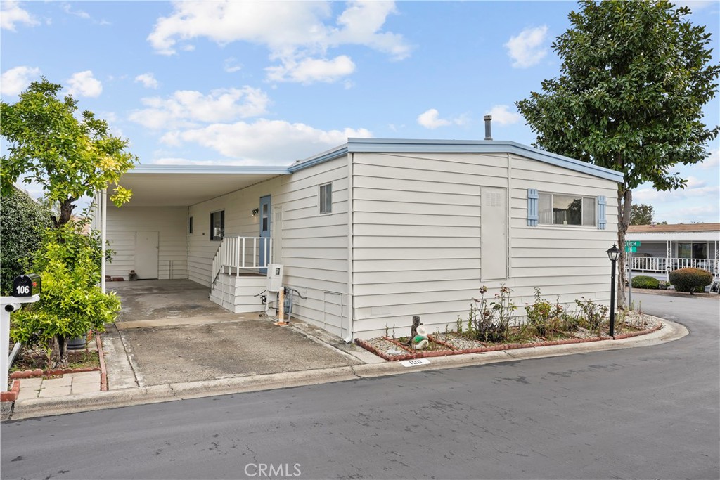 650 South Rancho Santa Fe Road, Unit 106 San Marcos, CA 92078 - Photo 13 of 55 a view of a house with a street