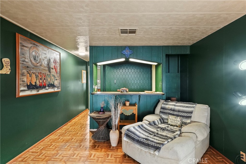 650 South Rancho Santa Fe Road, Unit 106 San Marcos, CA 92078 - Photo 22 of 55 a living room with furniture