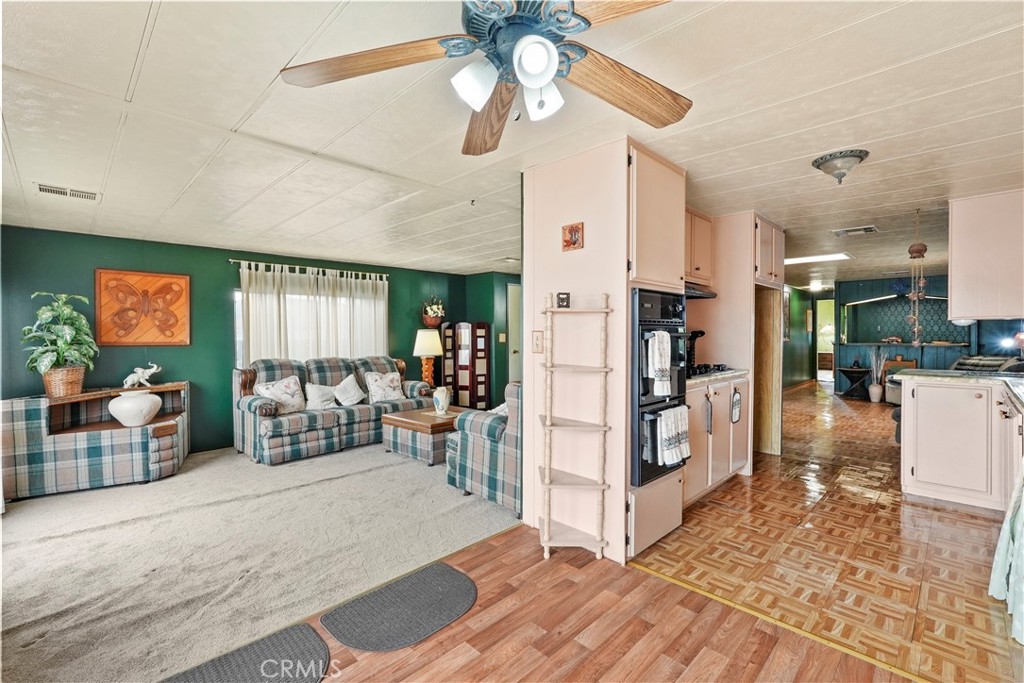 650 South Rancho Santa Fe Road, Unit 106 San Marcos, CA 92078 - Photo 40 of 55 a view of a livingroom with furniture and a livingroom