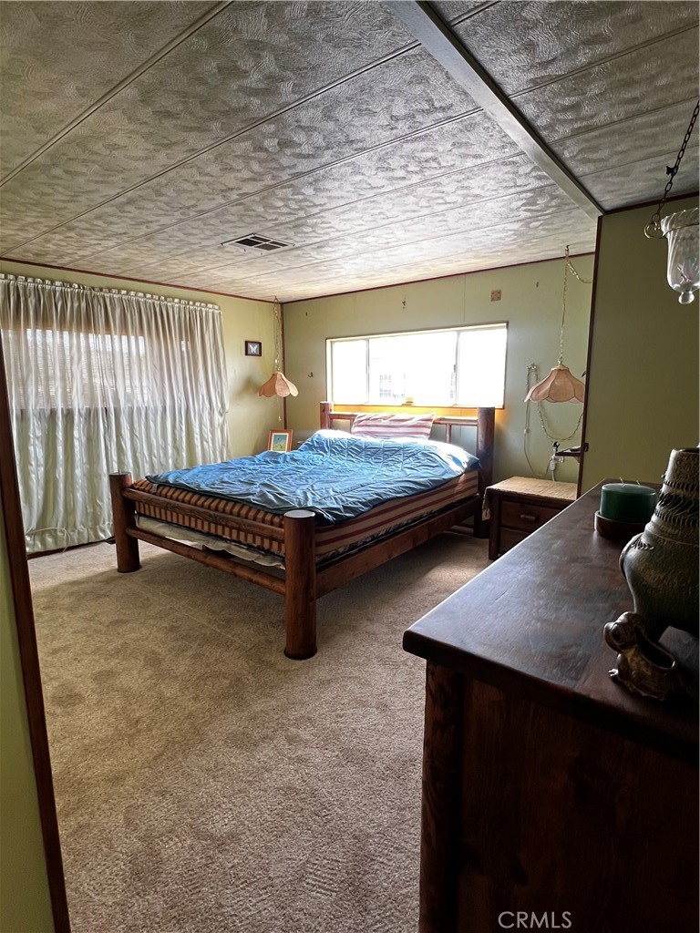 650 South Rancho Santa Fe Road, Unit 106 San Marcos, CA 92078 - Photo 46 of 55 a bedroom with bunk bed and window