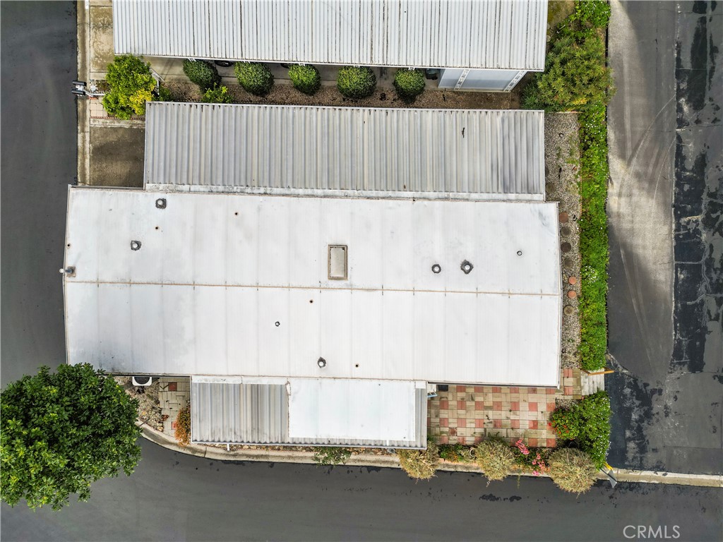 650 South Rancho Santa Fe Road, Unit 106 San Marcos, CA 92078 - Photo 5 of 55 a view of a house with a wooden fence