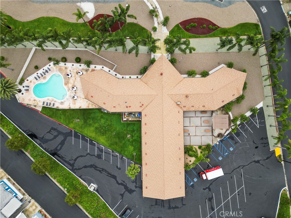 650 South Rancho Santa Fe Road, Unit 106 San Marcos, CA 92078 - Photo 8 of 55 an aerial view of multiple houses with yard