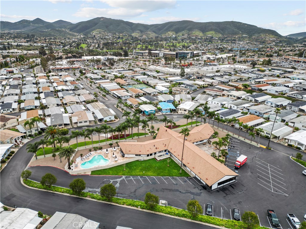 650 South Rancho Santa Fe Road, Unit 106 San Marcos, CA 92078 - Photo 9 of 55 an aerial view of residential house with outdoor space