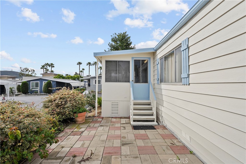 650 South Rancho Santa Fe Road, Unit 106 San Marcos, CA 92078 - Photo 10 of 55 a view of a house with backyard and sitting area
