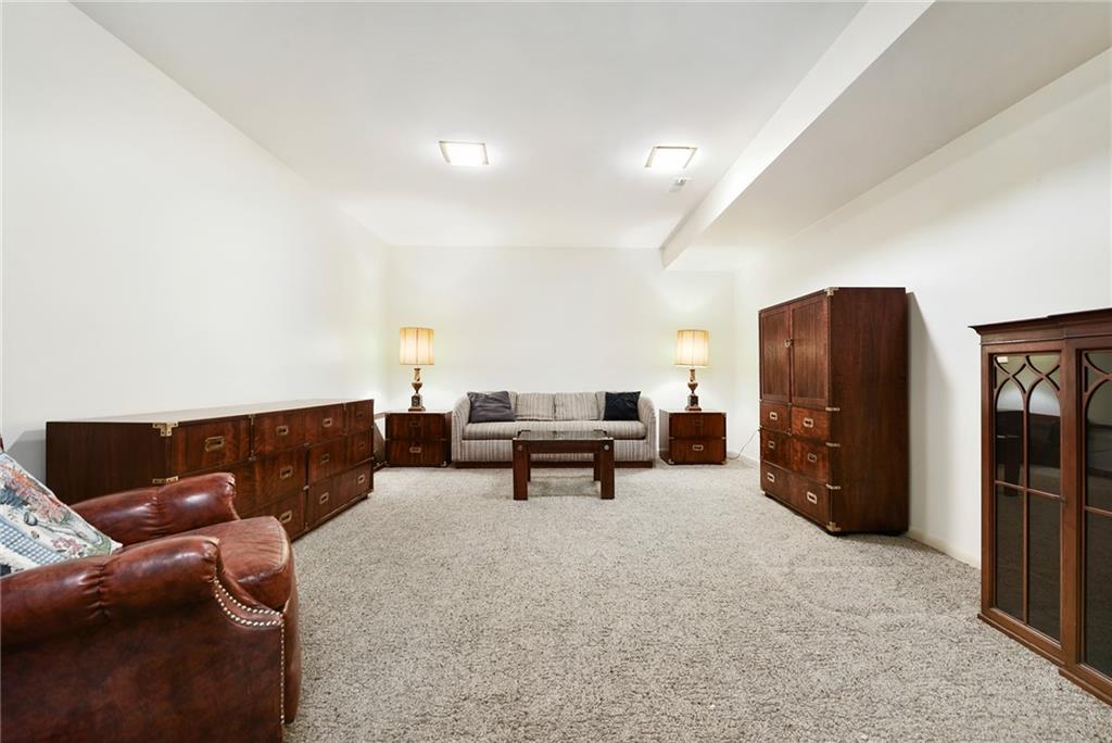 154 Gilda Avenue Pittsburgh, PA 15217 - Photo 21 of 25 a living room with furniture and a couch