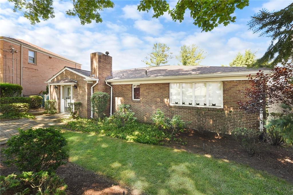 154 Gilda Avenue Pittsburgh, PA 15217 - Photo 25 of 25 a front view of a house with garden