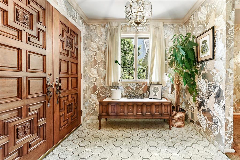 154 Gilda Avenue Pittsburgh, PA 15217 - Photo 3 of 25 a living room with furniture and a chandelier