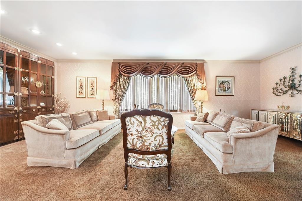 154 Gilda Avenue Pittsburgh, PA 15217 - Photo 4 of 25 a living room with furniture and a large window