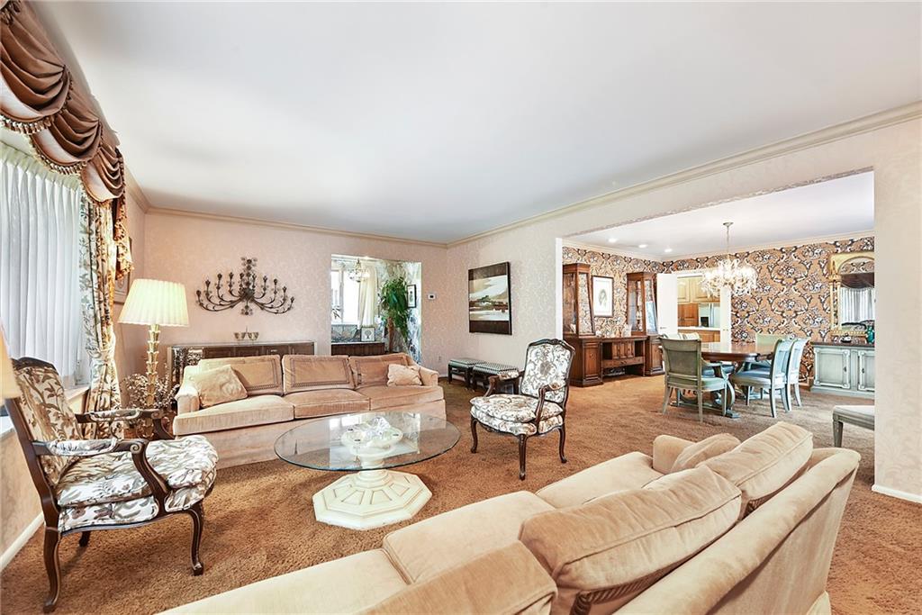 154 Gilda Avenue Pittsburgh, PA 15217 - Photo 5 of 25 a living room with furniture and a large window