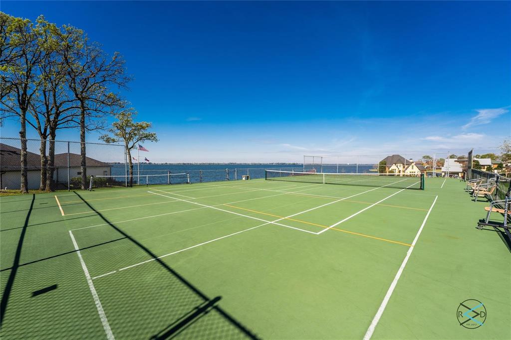 229 Colonial Drive Mabank, TX 75156 - Photo 12 of 22 a view of an outdoor space and tennis court