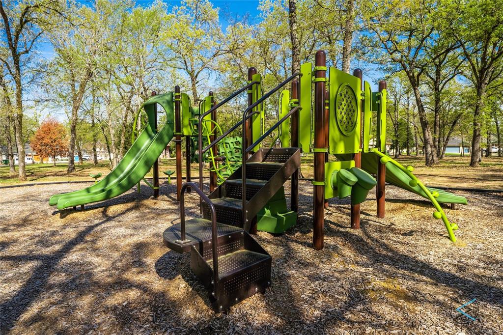 229 Colonial Drive Mabank, TX 75156 - Photo 14 of 22 a view of a park with large trees