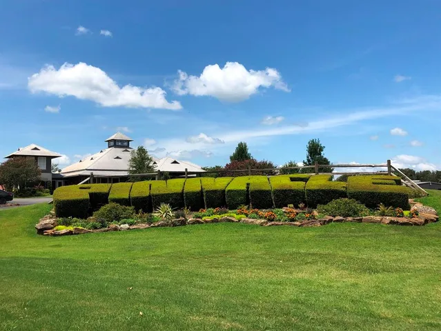 a view of an outdoor space and tennis court