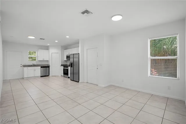 an empty room with windows