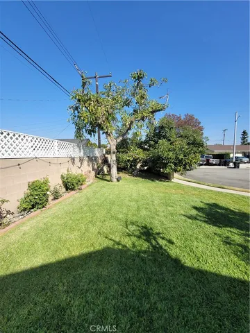 a view of a house with a garden