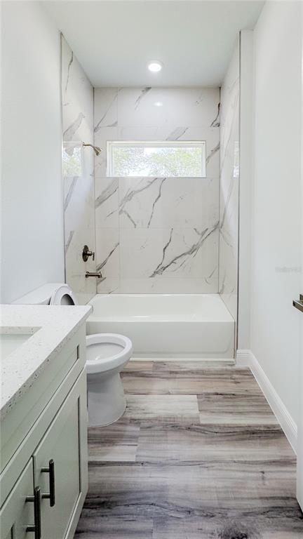 15625 Southwest 37th Circle Ocala, FL 34473 - Photo 19 of 27 a bathroom with a sink and a mirror