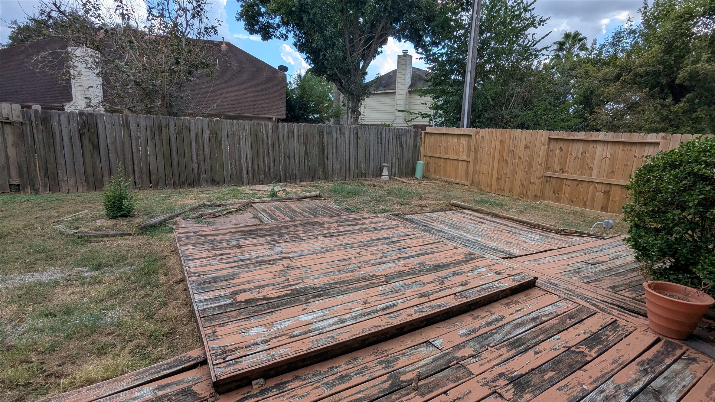 18319 North Willow Bluff Road Katy, TX 77449 - Photo 19 of 23 a view of a backyard with wooden fence