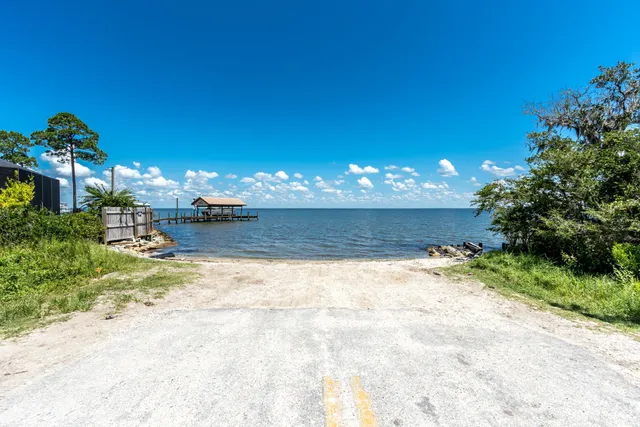 a view of a fountain in middle of the garden